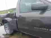 2014 Chevrolet Silverado 1500 Work Truck z VIN 1GCNKPEC6EZ296723, wystawiony jako IAAI lot #42336207 z przebiegiem 247 718 mil mil oraz . Historia ofert i sprzedaży dostępna na DreamBid. Obrazek 6.