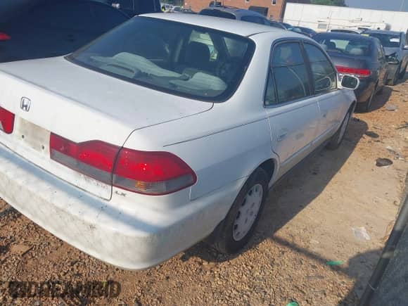2001 Honda Accord LX with VIN 1HGCG56411A007343, listed as a IAAI auction lot 42659586 with 343,593 mi miles and . Bid and sale history available at DreamBid. Image 4.