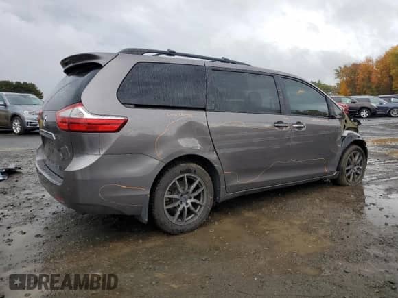 2016 Toyota Sienna Limited Premium with VIN 5TDDK3DC7GS141401, listed as a Copart auction lot 87085125 with 136,448 mi miles and Salvage title. Bid and sale history available at DreamBid. Image 3.