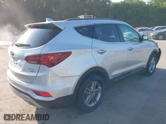 2017 Hyundai Santa Fe 2.4L with VIN 5XYZUDLB6HG491163, listed as a IAAI auction lot 42729584 with 91,606 mi miles and . Bid and sale history available at DreamBid. Image 4.