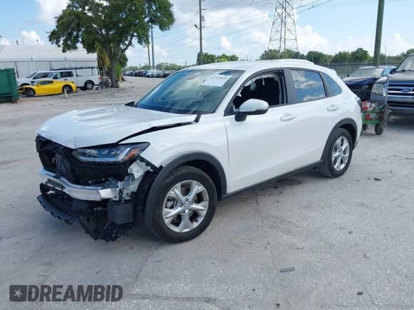 2025 Honda HR-V LX with VIN 3CZRZ1H31SM726848, listed as a IAAI auction lot 42785818 with 7,039 mi miles and . Bid and sale history available at DreamBid. Image 23.