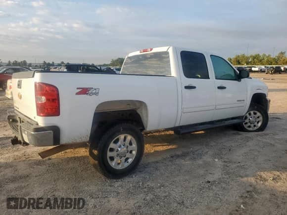 2013 Chevrolet Silverado 2500HD LT с VIN 1GC1KXCG1DF157748, выставлен на аукционе Copart как лот 82367485 с пробегом 153 381 миль миль и Списание • Salvage title. История ставок и продаж доступна на DreamBid. Изображение 3.