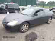 2004 Honda Accord EX with VIN 1HGCM82644A015877, listed as a IAAI auction lot 42882305 with 142,728 mi miles and . Bid and sale history available at DreamBid. Image 2.