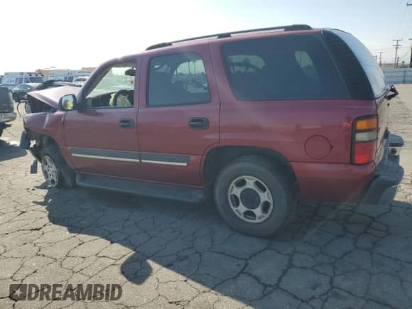 2004 Chevrolet Tahoe LS with VIN 1GNEC13T44R294049, listed as a Copart auction lot 59900565 with 149,379 mi miles and Salvage title. Bid and sale history available at DreamBid. Image 2.