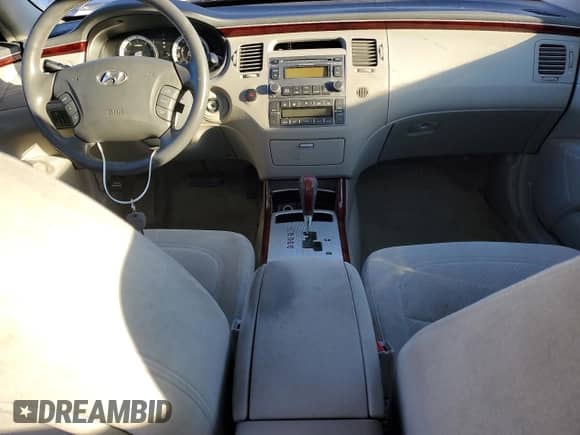 2007 Hyundai Azera GLS с VIN KMHFC46D67A222464, выставлен на аукционе Copart как лот 87528555 с пробегом 217 318 миль миль и Чистый • Clean title. История ставок и продаж доступна на DreamBid. Изображение 8.