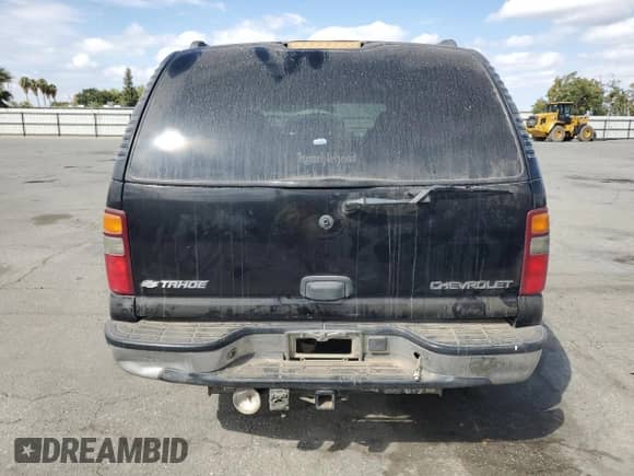 2003 Chevrolet Tahoe LS с VIN 1GNEC13V33R218404, выставлен на аукционе Copart как лот 71675765 с пробегом 188 108 миль миль и Списание • Salvage title. История ставок и продаж доступна на DreamBid. Изображение 6.