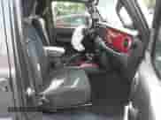 2021 Jeep Wrangler Unlimited Willys with VIN 1C4HJXDG2MW646904, listed as a IAAI auction lot 42267506 with 55,530 mi miles and . Bid and sale history available at DreamBid. Image 5.