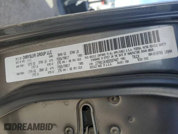 2011 Ram 1500 ST with VIN 1D7RB1GK4BS597407, listed as a Copart auction lot 87227454 with 224,398 mi miles and Salvage title. Bid and sale history available at DreamBid. Image 14.