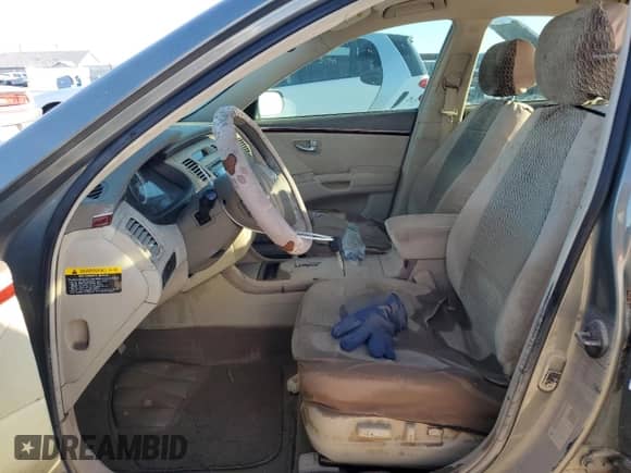 2007 Hyundai Azera SE с VIN KMHFC46F07A184036, выставлен на аукционе Copart как лот 79438334 с пробегом Не указан миль и Списание • Salvage title. История ставок и продаж доступна на DreamBid. Изображение 7.