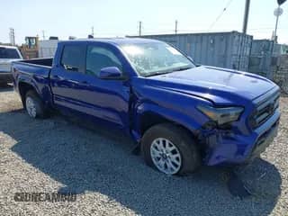 2024 Toyota Tacoma TRD Off Road with VIN 3TMLB5JN7RM001123, listed as a IAAI auction lot 43085472 with 35,813 mi miles and . Bid and sale history available at DreamBid. Image 1.