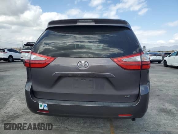 2015 Toyota Sienna LE with VIN 5TDKK3DC8FS629214, listed as a Copart auction lot 82405195 with 131,535 mi miles and Salvage title. Bid and sale history available at DreamBid. Image 6.