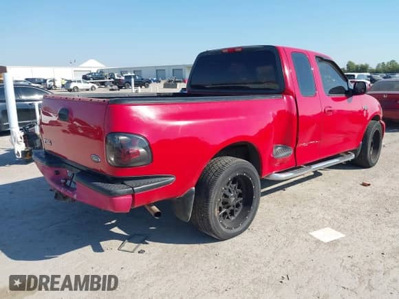 2003 Ford F-150 XL with VIN 1FTRX072X3KD60721, listed as a IAAI auction lot 43346686 with Not provided miles and . Bid and sale history available at DreamBid. Image 4.