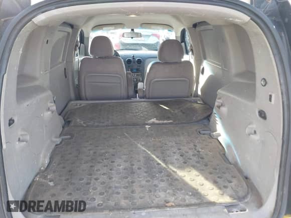 2009 Chevrolet HHR LS with VIN 3GCCA85B59S612879, listed as a IAAI auction lot 41603958 with 128,751 mi miles and . Bid and sale history available at DreamBid. Image 8.