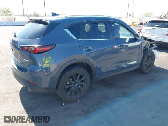 2022 Mazda CX-5 S Preferred z VIN JM3KFBCM2N1565165, wystawiony jako IAAI lot #42507203 z przebiegiem 39 853 mil mil oraz . Historia ofert i sprzedaży dostępna na DreamBid. Obrazek 4.