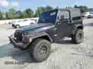 1997 Jeep Wrangler Sport with VIN 1J4FY19S1VP496609, listed as a Copart auction lot 69605495 with 188,432 mi miles and Salvage title. Bid and sale history available at DreamBid. Image 1.