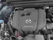 2023 Mazda CX-5 S Carbon Edition z VIN JM3KFBCM7P0104374, wystawiony jako IAAI lot #42329421 z przebiegiem 27 575 mil mil oraz . Historia ofert i sprzedaży dostępna na DreamBid. Obrazek 10.