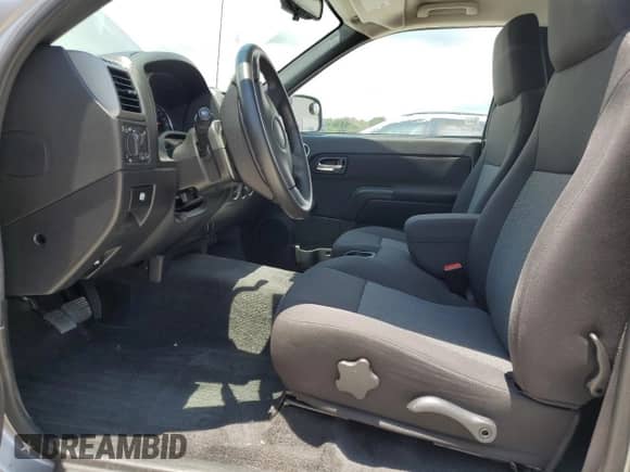 2012 Chevrolet Colorado Work Truck with VIN 1GCCSBF9XC8130687, listed as a Copart auction lot 63695255 with 19,677 mi miles and Salvage title. Bid and sale history available at DreamBid. Image 7.