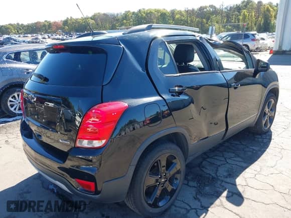 2018 Chevrolet Trax Premier z VIN KL7CJRSBXJB670364, wystawiony jako IAAI lot #43407561 z przebiegiem 94 656 mil mil oraz . Historia ofert i sprzedaży dostępna na DreamBid. Obrazek 4.
