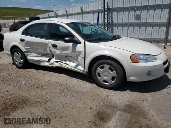 2003 Dodge Stratus SE with VIN 1B3EL36XX3N520704, listed as a Copart auction lot 61857735 with 64,326 mi miles and Clean title. Bid and sale history available at DreamBid. Image 4.