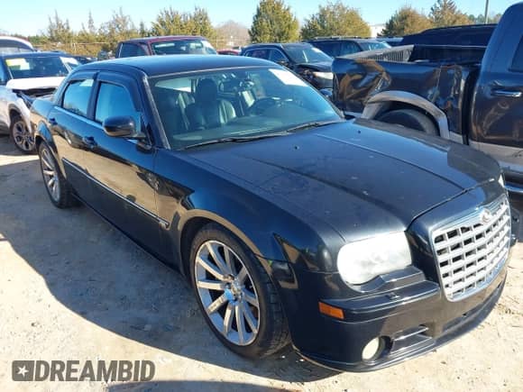 2006 Chrysler 300 C SRT-8 with VIN 2C3LA73W06H216409, listed as a IAAI auction lot 41588832 with 187,662 mi miles and . Bid and sale history available at DreamBid. Image 1.