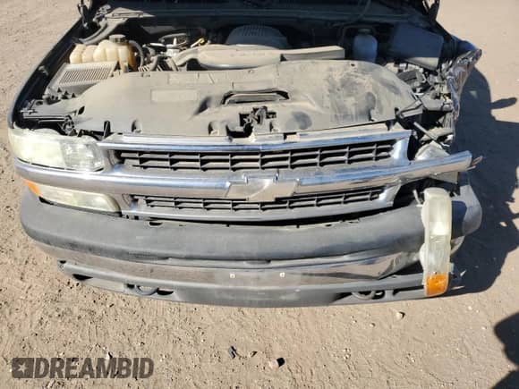 2004 Chevrolet Suburban LS z VIN 1GNEC16T04J241374, wystawiony jako Copart lot #76786994 z przebiegiem 183 755 mil mil oraz Czysty tytuł • Clean title. Historia ofert i sprzedaży dostępna na DreamBid. Obrazek 12.