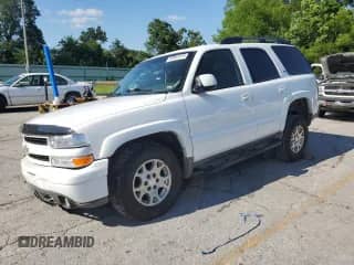 2005 Chevrolet Tahoe Z71 with VIN 1GNEK13T35R130344, listed as a Copart auction lot 60981675 with 217,789 mi miles and Salvage title. Bid and sale history available at DreamBid. Image 1.