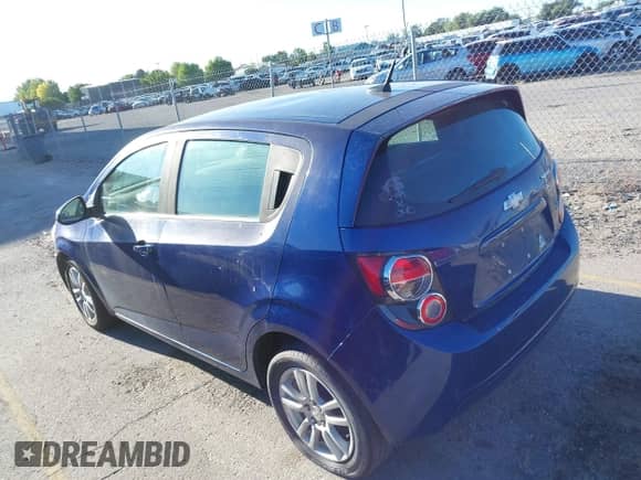 2013 Chevrolet Sonic LT with VIN 1G1JC6SHXD4248345, listed as a IAAI auction lot 42723072 with 128,100 mi miles and . Bid and sale history available at DreamBid. Image 3.