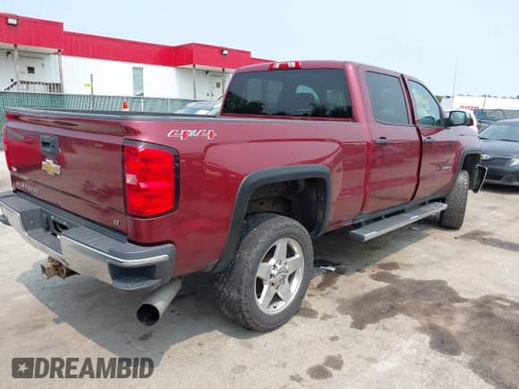 2015 Chevrolet Silverado 2500HD LT z VIN 1GC1KVE83FF102831, wystawiony jako IAAI lot #42411608 z przebiegiem 140 538 mil mil oraz . Historia ofert i sprzedaży dostępna na DreamBid. Obrazek 4.