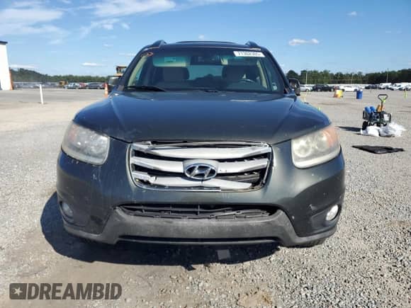 2012 Hyundai Santa Fe Limited с VIN 5XYZKDAG0CG126815, выставлен на аукционе Copart как лот 71302305 с пробегом 210 716 миль миль и Списание • Salvage title. История ставок и продаж доступна на DreamBid. Изображение 5.