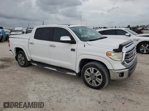 2016 Toyota Tundra Platinum with VIN 5TFGW5F12GX198415, listed as a Copart auction lot 54560715 with 28,678 mi miles and Clean title. Bid and sale history available at DreamBid. Image 4.