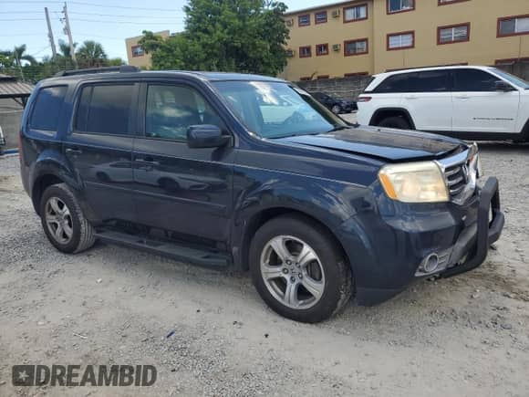 2012 Honda Pilot EX with VIN 5FNYF3H48CB040035, listed as a Copart auction lot 69468745 with 164,187 mi miles and Salvage title. Bid and sale history available at DreamBid. Image 4.
