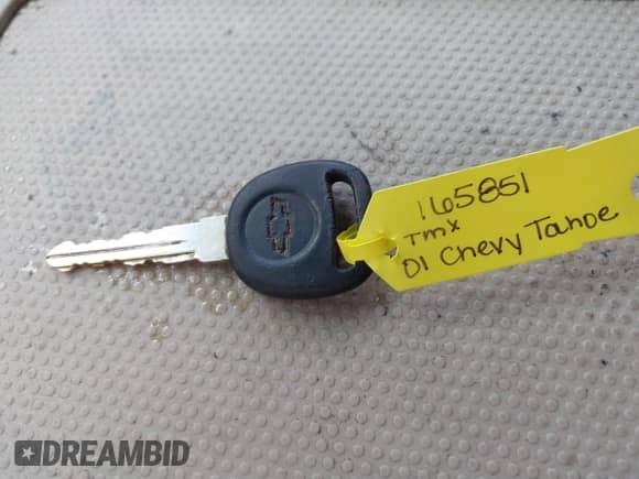 2001 Chevrolet Tahoe LT z VIN 1GNEC13T91R165851, wystawiony jako IAAI lot #41484165 z przebiegiem 279 544 mil mil oraz . Historia ofert i sprzedaży dostępna na DreamBid. Obrazek 11.