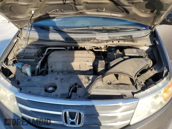 2013 Honda Odyssey Touring z VIN 5FNRL5H93DB050994, wystawiony jako Copart lot #89448415 z przebiegiem 138 294 mil mil oraz Czysty tytuł • Clean title. Historia ofert i sprzedaży dostępna na DreamBid. Obrazek 12.