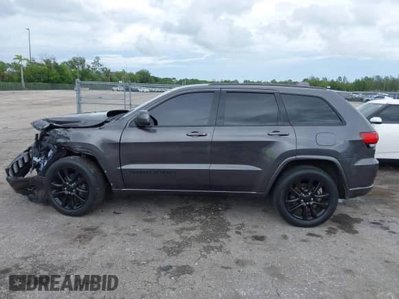 2018 Jeep Grand Cherokee Altitude with VIN 1C4RJEAG2JC428214, listed as a IAAI auction lot 42661661 with 81,859 mi miles and . Bid and sale history available at DreamBid. Image 15.