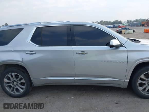 2021 Chevrolet Traverse Premier with VIN 1GNEVKKW9MJ213346, listed as a IAAI auction lot 41591024 with 112,803 mi miles and . Bid and sale history available at DreamBid. Image 13.