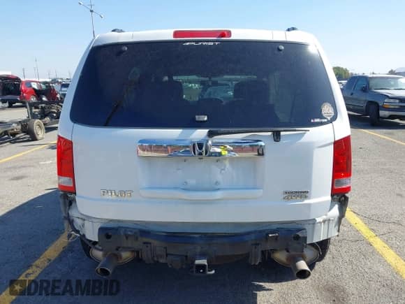 2014 Honda Pilot Touring z VIN 5FNYF4H95EB047979, wystawiony jako IAAI lot #43526927 z przebiegiem 158 501 mil mil oraz . Historia ofert i sprzedaży dostępna na DreamBid. Obrazek 17.