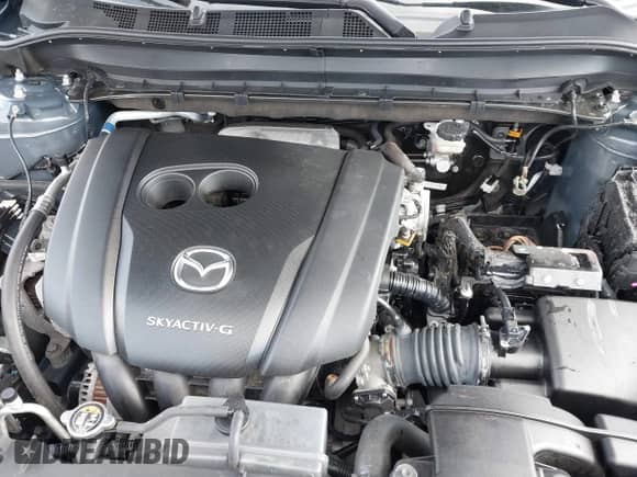 2022 Mazda CX-5 S Carbon Edition z VIN JM3KFBCM7N0579780, wystawiony jako IAAI lot #41460860 z przebiegiem 43 479 mil mil oraz . Historia ofert i sprzedaży dostępna na DreamBid. Obrazek 10.