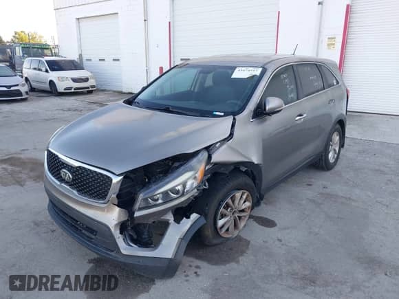 2016 Kia Sorento LX z VIN 5XYPG4A38GG185459, wystawiony jako IAAI lot #43474517 z przebiegiem 86 697 mil mil oraz . Historia ofert i sprzedaży dostępna na DreamBid. Obrazek 6.