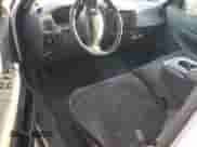 1999 Ford F-150 z VIN 1FTRX18W9XNB08065, wystawiony jako Copart lot #80306974 z przebiegiem Nie podano mil oraz Szkoda całkowita • Salvage title. Historia ofert i sprzedaży dostępna na DreamBid. Obrazek 8.