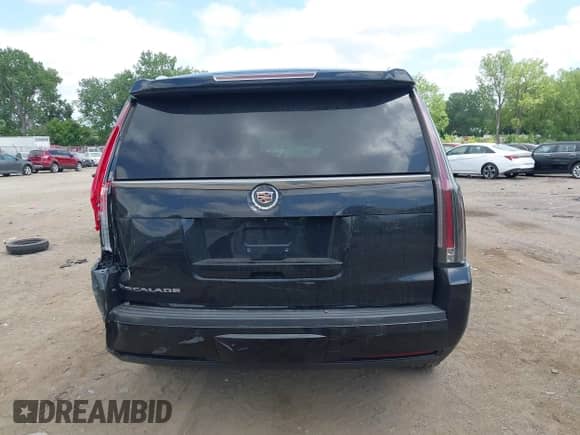 2015 Cadillac Escalade Premium z VIN 1GYS4CKJ9FR254258, wystawiony jako IAAI lot #42574409 z przebiegiem 129 511 mil mil oraz . Historia ofert i sprzedaży dostępna na DreamBid. Obrazek 16.
