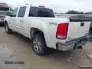 2011 GMC Sierra 1500 SLE with VIN 3GTU2VE22BG254441, listed as a IAAI auction lot 41398776 with 239,024 mi miles and . Bid and sale history available at DreamBid. Image 3.