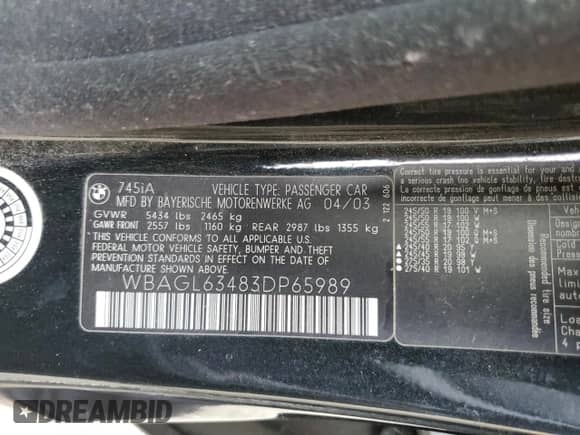 2003 BMW 7 Series 745i with VIN WBAGL63483DP65989, listed as a Copart auction lot 82057064 with 60,735 mi miles and Salvage title. Bid and sale history available at DreamBid. Image 13.