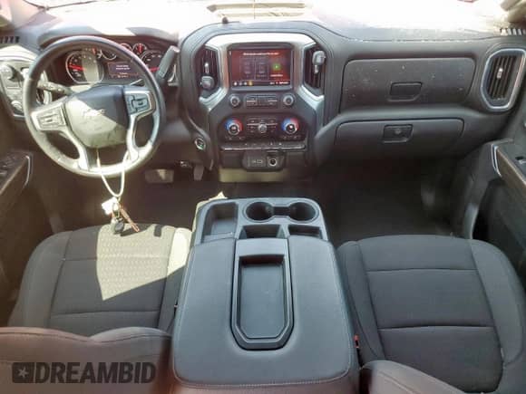 2021 Chevrolet Silverado 1500 LT с VIN 3GCPWCED6MG382188, выставлен на аукционе Copart как лот 82075985 с пробегом 52 700 миль миль и Списание • Salvage title. История ставок и продаж доступна на DreamBid. Изображение 8.