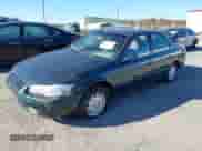 1998 Toyota Camry LE z VIN JT2BG22KXW0218012, wystawiony jako IAAI lot #43423460 z przebiegiem Nie podano mil oraz . Historia ofert i sprzedaży dostępna na DreamBid. Obrazek 2.