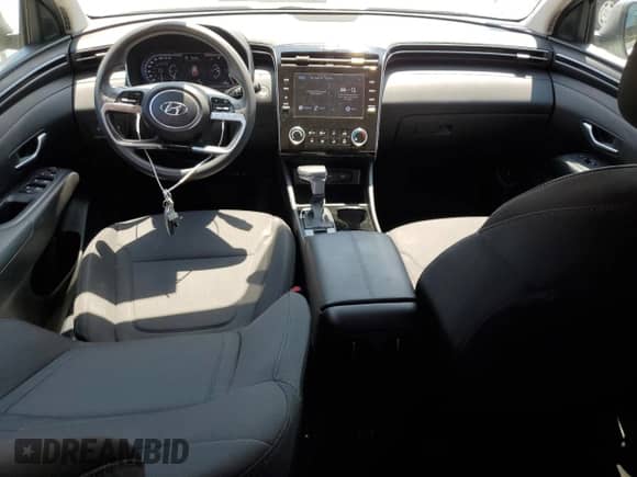 2022 Hyundai Tucson SEL with VIN 5NMJBCAEXNH091313, listed as a Copart auction lot 69121265 with 31,576 mi miles and Salvage title. Bid and sale history available at DreamBid. Image 8.