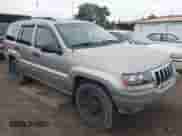 2002 Jeep Grand Cherokee Sport with VIN 1J4GW38S62C156866, listed as a IAAI auction lot 42879186 with 194,324 mi miles and . Bid and sale history available at DreamBid. Image 1.