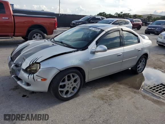 2000 Dodge Neon Highline with VIN 1B3ES46C9YD691348, listed as a Copart auction lot 69740835 with 205,868 mi miles and Salvage title. Bid and sale history available at DreamBid. Image 1.