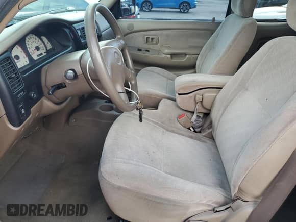 2004 Toyota Tacoma PreRunner with VIN 5TESN92N54Z340774, listed as a Copart auction lot 82484455 with 147,005 mi miles and Salvage title. Bid and sale history available at DreamBid. Image 7.