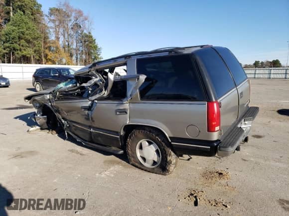 1998 Chevrolet Tahoe z VIN 1GNEK13R1WJ374532, wystawiony jako Copart lot #78623553 z przebiegiem 224 772 mil mil oraz Nie do naprawy • Non repairable. Historia ofert i sprzedaży dostępna na DreamBid. Obrazek 2.