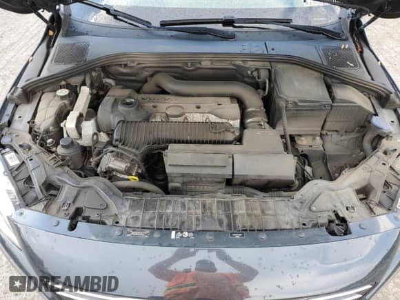 2015 Volvo S60 T5 Premier с VIN YV1612TB6F1299877, выставлен на аукционе Copart как лот 62590695 с пробегом 91 096 миль миль и Списание • Salvage title. История ставок и продаж доступна на DreamBid. Изображение 11.